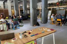 Akteur*innen der Bio-Branche diskutieren über organisationsübergreifende Zusammenarbeit im Rahmen der Initiative ‚Solidarische Region München‘ unter dem Motto ‚bio goes eco‘.
